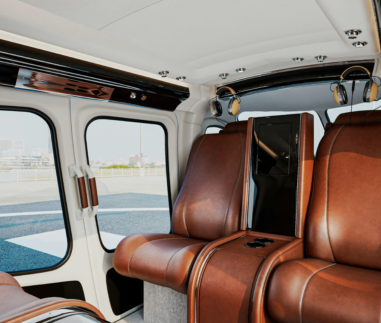 A helicopter with brown leather seats and windows.