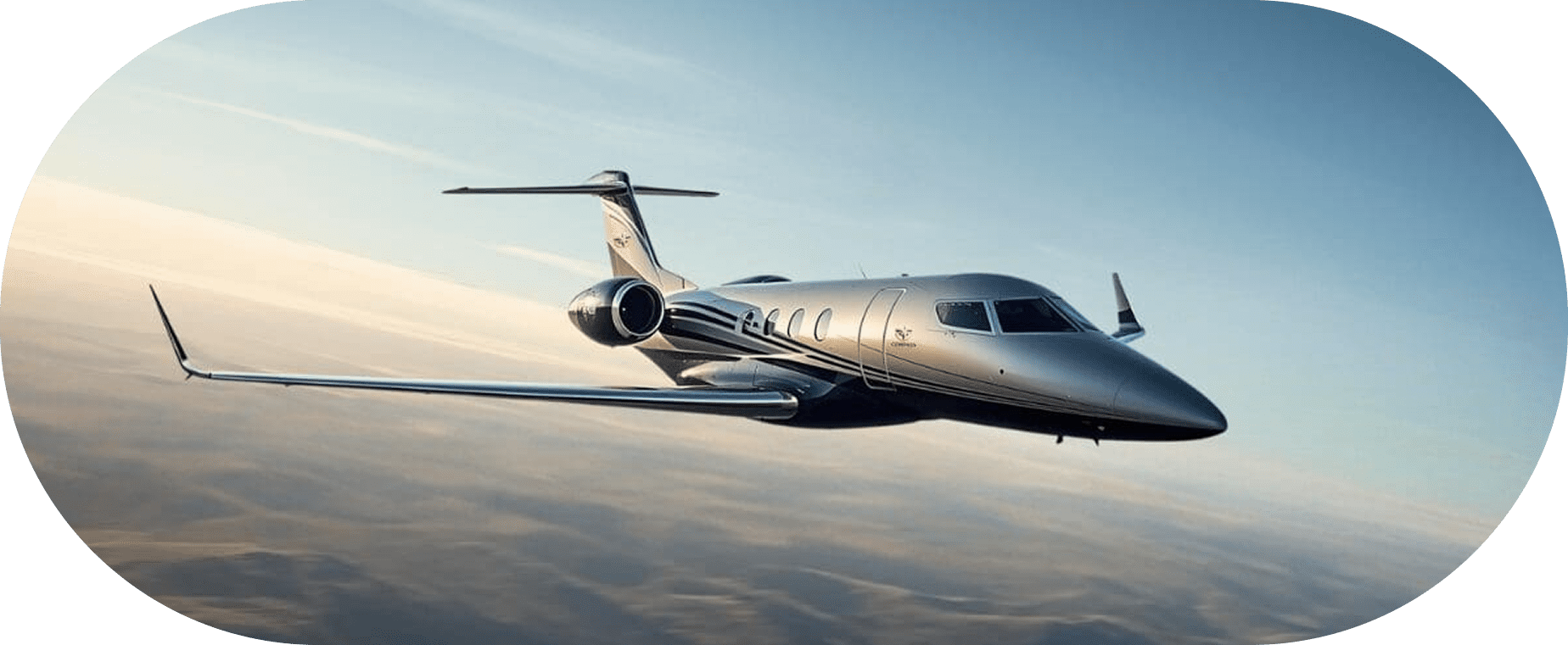 A private jet flying above the clouds during sunset.